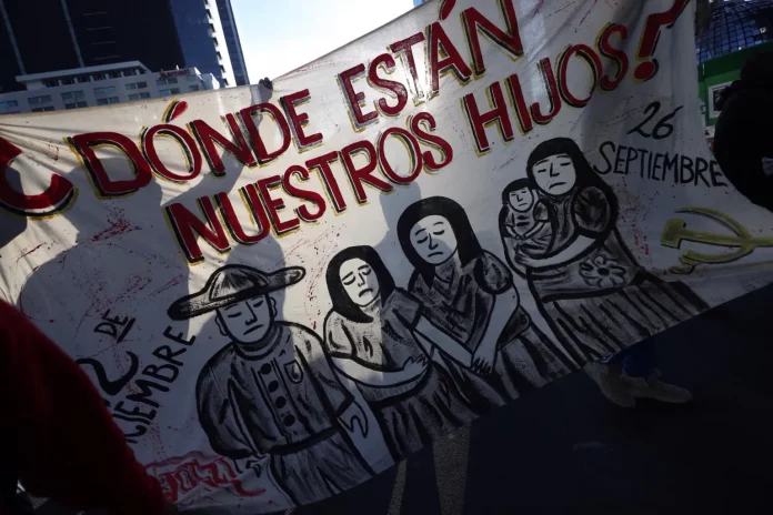 manifestacion-en-9no-aniversario-del-caso-ayotzinapa